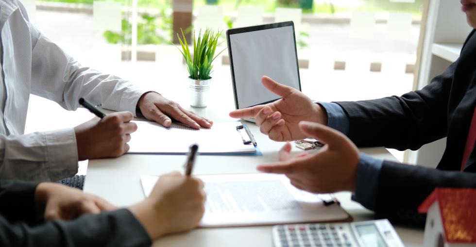 Business people discussing documents